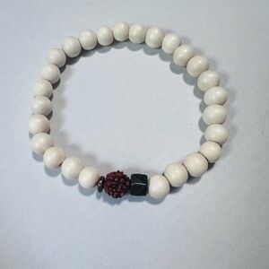 Elegant White Beaded Bracelet with Red Accent
